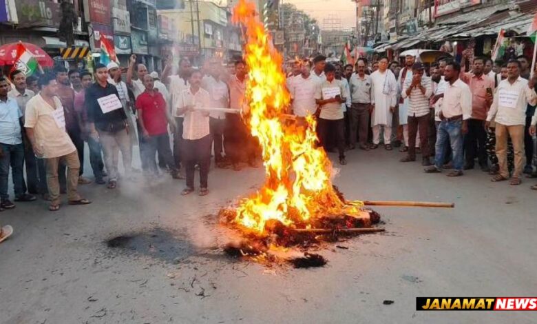 Congress burns effigies of PM, CEC during protest rally in Kailashahar |