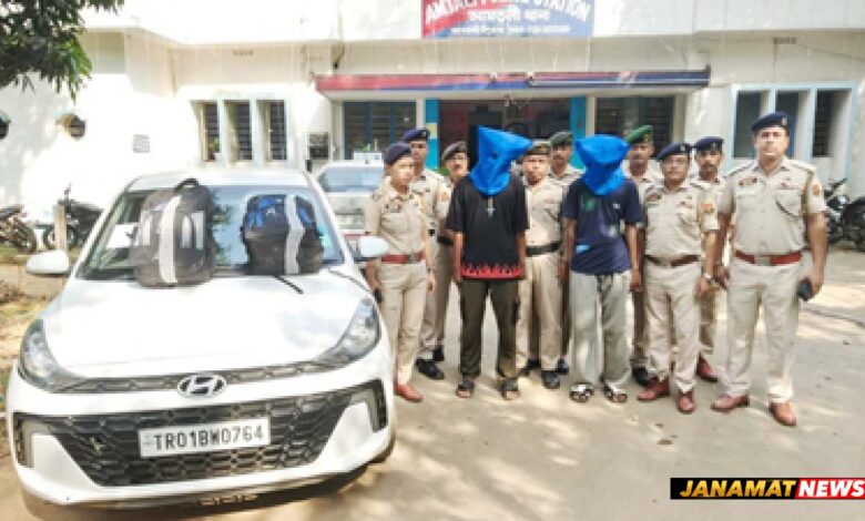 Police arrest two persons and seize a car at Amtali Police Station in Agartala on September 30. |